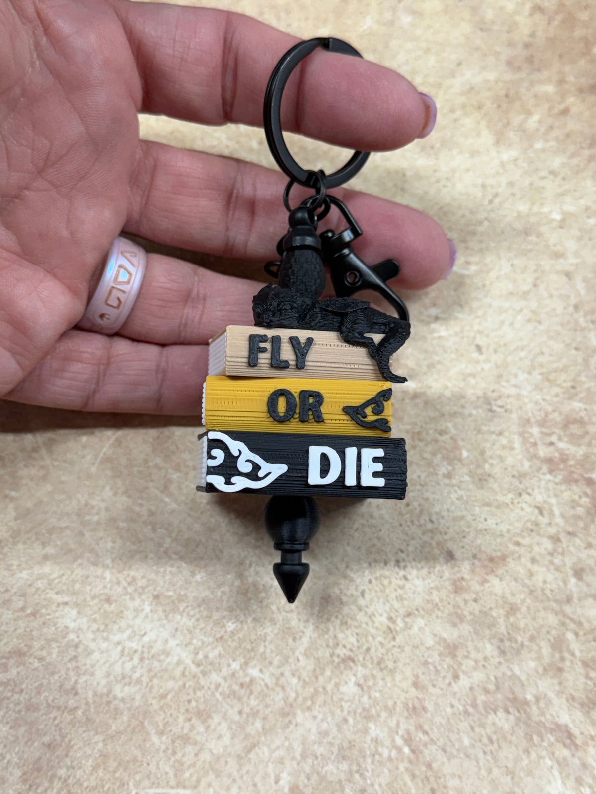 Fly or Die Dragon Book Stack Keychain