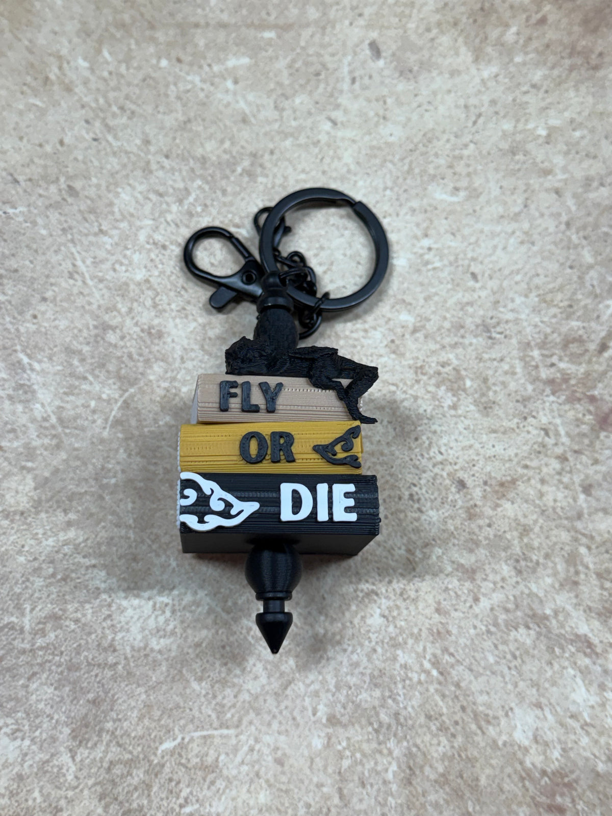 Fly or Die Dragon Book Stack Keychain